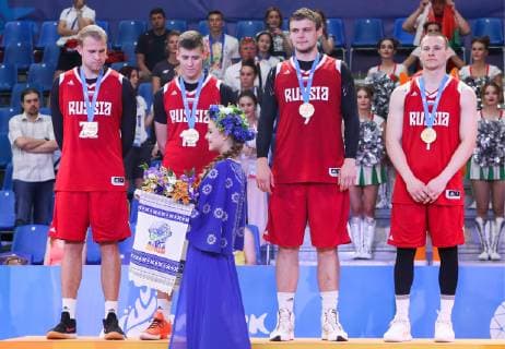 MINSK, BELARUS - JUNE 24, 2019: Russia s Alexei Zherdev, Kirill Pisklov, Ilya Karpenkov and Stanislav Sharov (L-R) pose with their gold medals at a victory ceremony after the men s 3x3 bastketball event at the 2nd Europaspiele Natalia Fedosenko TASS  TS0B0CDF