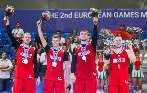 MINSK, BELARUS - JUNE 24, 2019: Russia s Alexei Zherdev, Kirill Pisklov, Ilya Karpenkov and Stanislav Sharov (L-R) pose with their gold medals at a victory ceremony after the men s 3x3 basketball event at the 2nd Europaspiele Russia won 21-14. Natalia Fedosenko TASS  TS0B0CE2