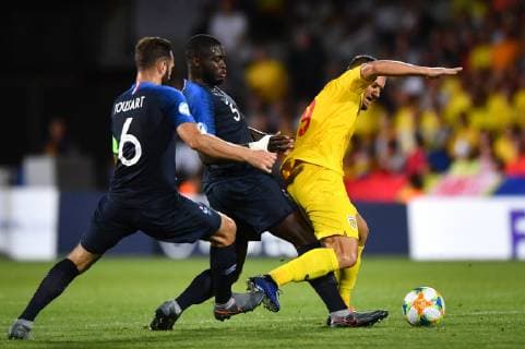 Photo Massimo Paolone LaPresse June 24, 2019 Cesena, Italy soccer France vs Romania - UEFA Under 21 Championship Italy 2019 - Group stage final tournament Group C - "Dino Manuzzi" stadium. In the pic: George Puscas (Romania) competes for the ball with Dayot Upamecano (Francia) and Lucas Tousart (Francia)  Copyright: xMassimoxPaolone LaPressex