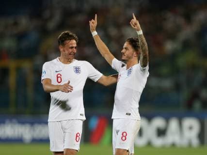 James Maddison of England (r) celebrates scoring the 2nd goal with Kieran Dowell of England during the UEFA Under-21 Championship 2019 match at San Marino Stadium, Serravalle. Picture date: 24th June 2019. Picture credit should read: Jonathan Moscrop Sportimage EDITORIAL USE ONLY. No use with unauthorised audio, video, data, fixture lists, club league logos or live services. Online in-match use limited to 120 images, no video emulation. No use in betting, games or single club league player publications. SPI-0105-0021