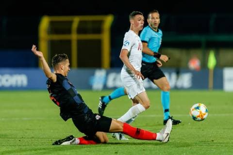 Serravalle, San Marino, 24 06 2019, UEFA U 21 European Championship Italy 2019, Group stage, Group C, Croatia England, Nikola Katic CRO and Phil Foden GBR in the total Defodi 01048 184155 Defodi-048