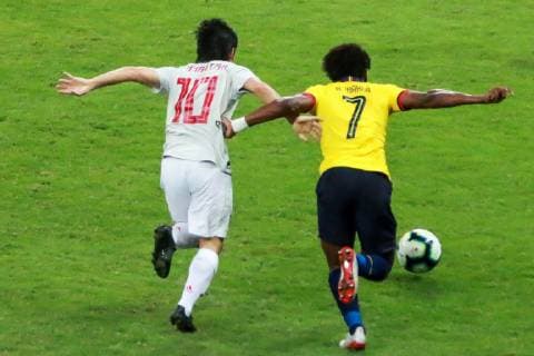 Ecuador vs Japan BELO HORIZONTE, MG - 24.06.2019: ECUADOR VS JAPAN - Dispute between Romário Ibarra of Ecuador and Nakajima of Japan during a match between Ecuador and Japan, valid for the group stage of the Copa America 2019, held this Monday (24) at the Estádio do Mineirão in Belo Horizonte, MG. (Photo: Dudu Macedo Fotoarena) x1752625x  DuduxMacedo