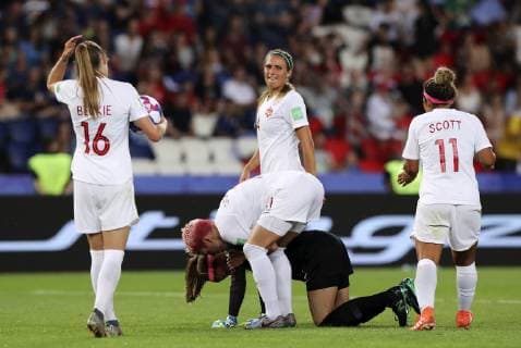 (190625) -- PARIS, June 25, 2019 -- Stephanie Labbe (Bottom) , goalie of Canada, looks dejected after Sweden s Stina Blackstenius scored the opening goal past her during the round of 16 match between Sweden and Canada at the 2019 FIFA Women s World Cup in Parc des Princes in Paris, France, June 24, 2019. Sweden won 1-0. ) (SP)FRANCE-PARIS-FIFA WOMEN S WORLD CUP-ROUND OF 16-SWE VS CAN GaoxJing 