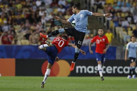 Chile x Uruguay RIO DE JANEIRO, RJ - 24.06.2019: CHILE X URUGUAY - Caceres and Aránguiz during a match between Chile and Uruguay, valid for the group stage of the Copa America 2019, held this Monday (24) at the Maracanã Stadium in Rio de Janeiro, RJ. (Photo: Ricardo Moreira Fotoarena) x1752591x  RicardoxMoreira
