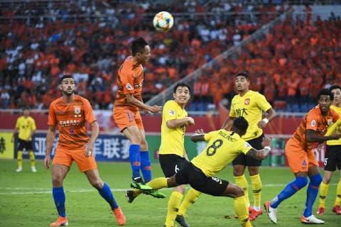 JINAN, CHINA - JUNE 25: Zhang Chi 13 of Shandong Luneng heads the ball during the AFC Champions League Round of 16 2nd Leg match between Shandong Luneng and Guangzhou Evergrande at Jinan Olympic Sports Center Stadium on June 25, 2019 in Jinan, Shandong Province of China.  Copyright: xVCGx CFP111222838594 