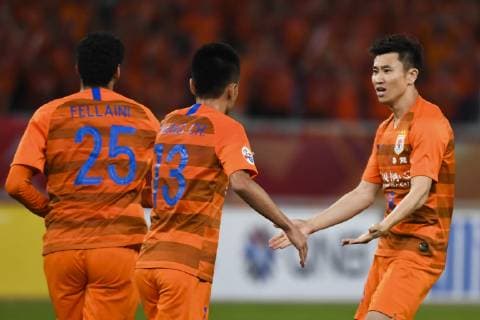 JINAN, CHINA - JUNE 25: Zhou Haibin 18 of Shandong Luneng celebrates a point with teammates during the AFC Champions League Round of 16 2nd Leg match between Shandong Luneng and Guangzhou Evergrande at Jinan Olympic Sports Center Stadium on June 25, 2019 in Jinan, Shandong Province of China.  Copyright: xVCGx CFP111222845700 