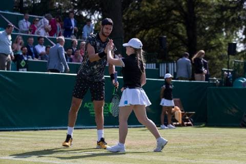 Karen Khachanov of Russia with ballgirl after she played part of the game for him during The BOODLES Tennis exhibition event 2019 at Stoke Park, Slough, England on 26 June 2019. Copyright: xAndyxRowlandx PMI-2882-0007