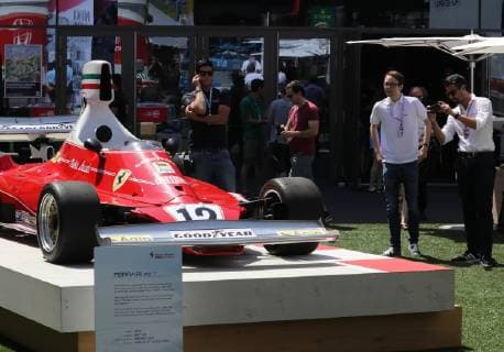 FORMULA 1 - GP of Austria 2019 SPIELBERG,AUSTRIA,27.JUN.19 - MOTORSPORTS, FORMULA 1 - Grand Prix of Austria, Red Bull Ring, preview. Image shows fans and a Ferrari 312T of Niki Lauda, 1975. GEPAxpictures xAndreasxPranter