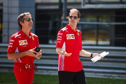 FORMULA 1 - GP of Austria 2019 SPIELBERG,AUSTRIA,27.JUN.19 - MOTORSPORTS, FORMULA 1 - Grand Prix of Austria, Red Bull Ring, preview. Image shows Sebastian Vettel (GER Ferrari) and an engineer. GEPAxpictures xDanielxGoetzhaber