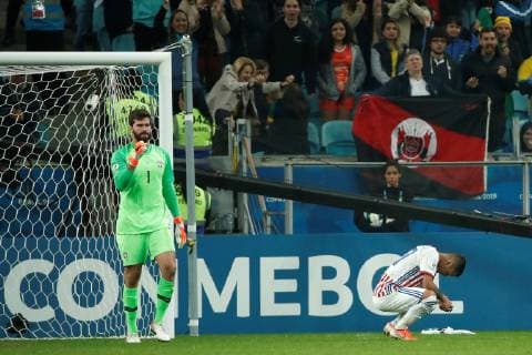 Brazilian goalkeeper Alisson Becker (L) celebrates in the penalties round, during the Copa America 2019 quarter-finals soccer match between Brazil and Paraguay, at Arena do Gremio Stadium in Porto Alegre, Brazil, 27 June 2019. Brazil vs. Paraguay !ACHTUNG: NUR REDAKTIONELLE NUTZUNG!  Copyright: xJosexMendezx SCA19225 20190628-636972962838829405
