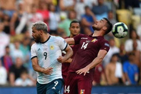 (190629) -- RIO DE JANEIRO, June 29, 2019 -- Argentina s Sergio Aguero(L) competes with Luis Mago of Venezuela during the Copa America 2019 quarterfinal match between Argentina and Venezuela, in Rio de Janeiro, Brazil, June 28, 2019. Argentina won 2-0. ) (SP)BRAZIL-RIO DE JANEIRO-FOOTBALL-COPA AMERICA 2019-ARG VS VEN XinxYuewei 