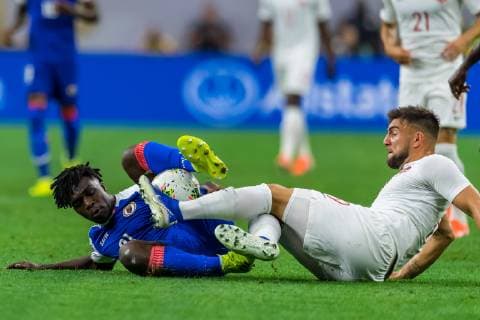 June 29, 2019 - Houston, Texas, USA - June 29, 2019 : Canada forward Lucas Cavallini (19) and Haiti midfielder Bryan Alceus (21) battle for the ball during a Concacaf Gold Cup Quarterfinals match between Haiti vs Canada at NRG Stadium in Houston, Texas. At the half Canada leads 2-0. ZUMA Press CONCACAF Gold Cup Quarterfinals 2019: Haiti vs Canada Jun 29 - ZUMAl153 20190629_zap_l153_011 Copyright: xMariaxLysakerx