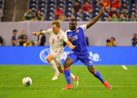 June 29, 2019: Canada midfielder, Scott Arfield (8), and Haiti forward, Frantzdy Pierrot (20), work for control of the ball during the 2019 CONCACAF Gold Cup, quarter final match between Haiti and Canada, at NRG Stadium in Houston, TX. Mandatory Credit: Sports South Media CSM 2019 CONCACAF Gold Cup: Haiti vs Canada Jun 29 - ZUMAc04_ 20190629_zaf_c04_080 Copyright: xKevinxLangleyx