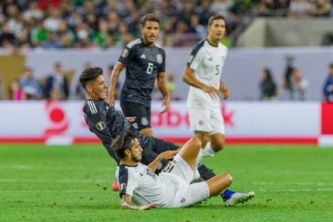 June 29, 2019 - Houston, Texas, USA - June 29, 2019 : Mexico defender Edson Alvarez (4) and Costa Rica midfielder Bryan Ruiz (10) battle for the ball during a Concacaf Gold Cup Quarterfinals match between Mexico and Costa Rica at NRG Stadium in Houston, Texas. At the half Mexico is in the lead 1-0. ZUMA Press CONCACAF Gold Cup Quarterfinals 2019: Mexico and Costa Rica Jun 29 - ZUMAl153 20190629_zap_l153_076 Copyright: xMariaxLysakerx