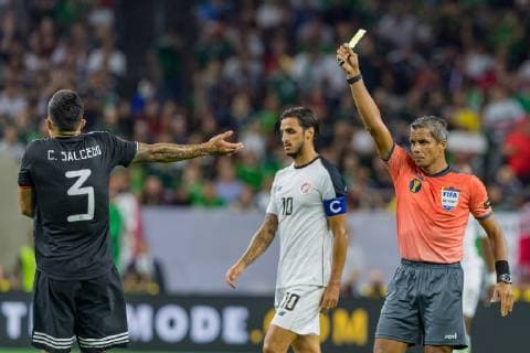 June 29, 2019 - Houston, Texas, USA - June 29, 2019 : Mexico defender Carlos Salcedo (3) reacts to getting a yellow card during a Concacaf Gold Cup Quarterfinals match between Mexico and Costa Rica at NRG Stadium in Houston, Texas. At the half Mexico is in the lead 1-0. ZUMA Press CONCACAF Gold Cup Quarterfinals 2019: Mexico and Costa Rica Jun 29 - ZUMAl153 20190629_zap_l153_074 Copyright: xMariaxLysakerx