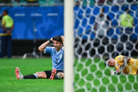 (190630) -- SALVADOR, June 30, 2019 -- Uruguay s Luis Suarez (L) reacts during the Copa America 2019 quarterfinal match between Uruguay and Peru in Salvador, Brazil, June 29, 2019. Peru won 5-4 in penalty shoot-out. ) (SP)BRAZIL-SALVADOR-FOOTBALL-COPA AMERICA 2019-PERU VS URUGUAY XinxYuewei 