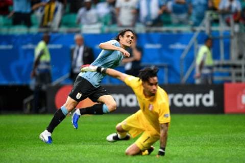 (190630) -- SALVADOR, June 30, 2019 -- Uruguay s Edinson Cavani (L) celebrates after scoring in penalty shoot-out during the Copa America 2019 quarterfinal match between Uruguay and Peru in Salvador, Brazil, June 29, 2019. Peru won 5-4 in penalty shoot-out. ) (SP)BRAZIL-SALVADOR-FOOTBALL-COPA AMERICA 2019-PERU VS URUGUAY XinxYuewei 