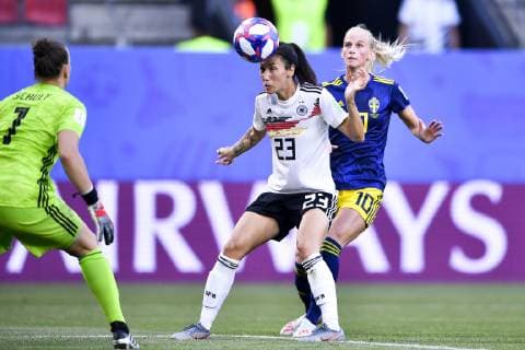 (190630) -- RENNES, June 30, 2019 -- Sara Doorsoun (C) of Germany defends Sofia Jakobsson (R) of Sweden during the quarterfinal between Germany and Sweden at the 2019 FIFA Women s World Cup at Roazhon Park in Rennes, France on June 29, 2019. Sweden won 2-1. ) (SP)FRANCE-RENNES-FIFA WOMEN S WORLD CUP-QUARTERFINALS-GER VS SWE ChenxYichen 