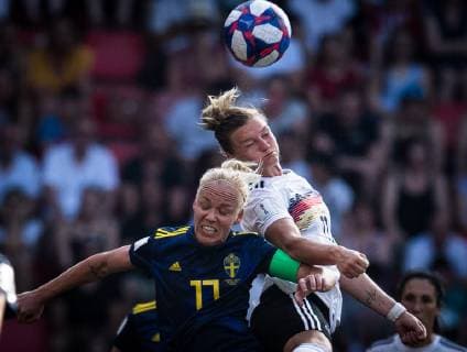 (190630) -- RENNES, June 30, 2019 -- Caroline Seger (L) of Sweden heads the ball with Alexandra Popp of Germany during the quarterfinal between Germany and Sweden at the 2019 FIFA Women s World Cup at Roazhon Park in Rennes, France on June 29, 2019. Sweden won 2-1. ) (SP)FRANCE-RENNES-FIFA WOMEN S WORLD CUP-QUARTERFINALS-GER VS SWE XiaoxYijiu 