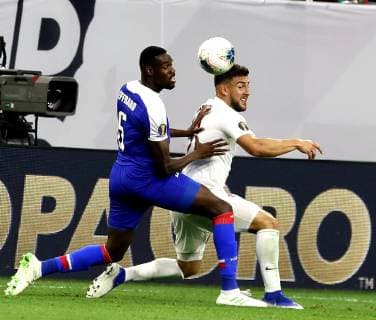 (190630) -- HOUSTON, JUNE 30, 2019 Haiti defender Jems Geffrard vies with Canada s forward Lucas Cavallini during the CONCACAF Gold Cup soccer tournament quarterfinal between Haiti and Canada at NRG Stadium in Houston, Texas, the United States on June 29, 2019. Haiti won 3-2. ) (SP)US-HOUSTON-FOOTBALL-CONCACAF-GOLD CUP-HAITI VS CANADA SongxQiong 