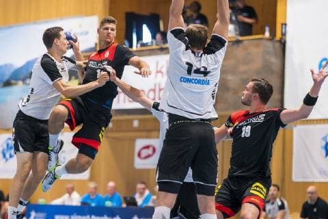 Kloten, Germany 30 June 2019 Handball, DHB U21 international Airport Trophy Switzerland vs. Germany Sebastian Heymann Germany FreshOn Goeppingen , Philip Novak Switzerland , Marcel Timm Germany HC 2000 Coburg Kloten Sporthalle Ruebisbach Switzerland
