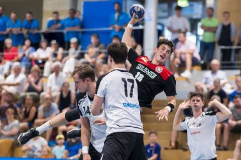 Kloten, Germany 30 June 2019 Handball, DHB U21 international Airport Trophy Switzerland vs Germany v li Philip Novak Switzerland , Michael Kusio Switzerland , Justin Kurch Germany SC Magdeburg Kloten Sporthalle Ruebisbach Switzerland