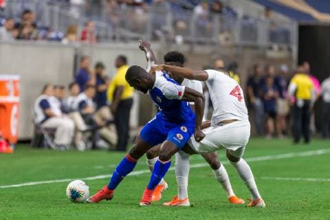 HOUSTON, TX - JUNE 29: players battle for the ball during the Quarterfinals match between Haiti and Canada as part of the 2019 CONCACAF Gold Cup on June 29, 2019, at NRG Stadium in Houston, Texas. (Photo by David Buono Icon Sportswire) SOCCER: JUN 29 CONCACAF Gold Cup Quarterfinals - Haiti v Canada Icon190629017