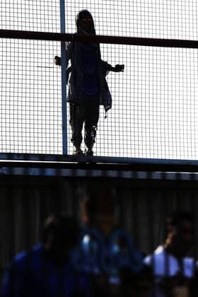 Iranian women sneak into soccer looks at his Esteghlal players ahead of before start the Persian Gulf Pro League 2019 2020,women who are already forbidden from watching the games in stadiums, on Jul 2, 2019, at in Tehran (photographer Amirhossein Kheirkhah) 