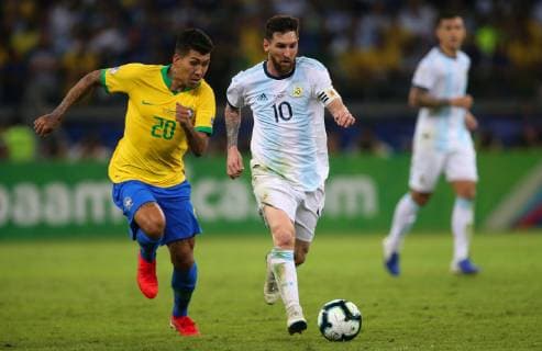 Brazil vs. Argentina BELO HORIZONTE, MG - 02.07.2019: BRAZIL VS. ARGENTINA - Lionel Messi of Argentina and Roberto Firmino of Brazil during a match between Brazil and Argentina, valid for the semifinal of Copa América 2019, held this Tuesday (02) at the Estádio do Mineirão in Belo Horizonte, MG. (Photo: Rodolfo Buhrer La Imagem Fotoarena) x1757517x  RodolfoxBuhrer