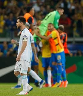 Brazil vs. Argentina BELO HORIZONTE, MG - 02.07.2019: BRAZIL VS. ARGENTINA - Players from Brazil celebrate qualifying for the final after winning the match between Brazil and Argentina for 2x0, valid for the semifinal of Copa America 2019, held this Tuesday (02) at the Estádio do Mineirão in Belo Horizonte, MG. In the photo: Lionel Messi of Argentina leaving the field. (Photo: Marcelo Machado de Melo Fotoarena) x1757567x  MarceloxMachadoxdexMelo