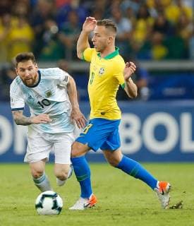 Brazil vs. Argentina BELO HORIZONTE, MG - 02.07.2019: BRAZIL VS. ARGENTINA - Lionel Messi from Argentina plays the ball with Arthur do Brasil during a match between Brazil and Argentina, valid for the semifinal of Copa América 2019, held on Tuesday (02) at the Estádio do Mineirão in Belo Horizonte, MG. (Photo: Marcelo Machado de Melo Fotoarena) x1757568x  MarceloxMachadoxdexMelo