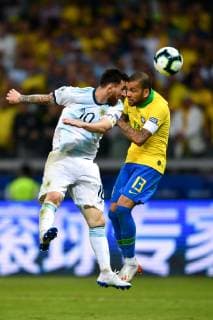 (190703) -- BELO HORIZONTE, July 3, 2019 -- Argentina s Lionel Messi (L) competes with Brazil s Dani Alves during the Copa America 2019 semifinal match between Argentina and Brazil, held in Belo Horizonte, Brazil, July 2, 2019. ) (SP)BRAZIL-BELO HORIZONTE-FOOTBALL-COPA AMERICA 2019-ARGENTINA VS BRAZIL XinxYuewei 