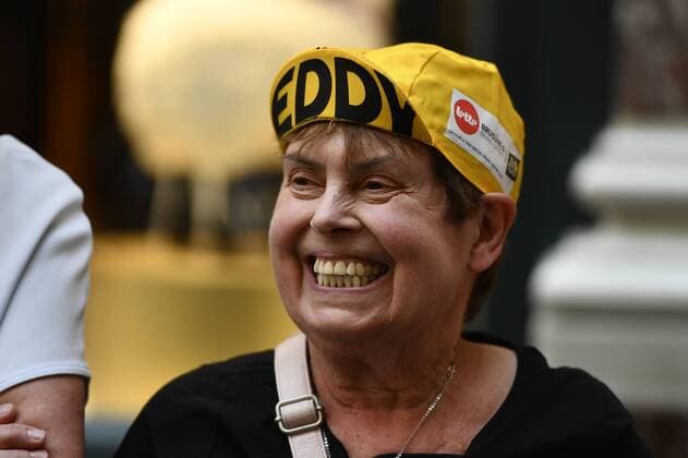 A cycling fan with Eddy Merckx cap pictured during a passage through the Koninklijke Sint-Hubertusgalerijen - Galeries royales Saint-Hubert gallery towards the team presentation for the 106th edition of the Tour de France cycling race, in Brussels, Belgium, Thursday 04 July 2019. This year s Tour de France starts in Brussels and takes place from July 6th to July 28th. ERICxLALMAND  x05619472x
