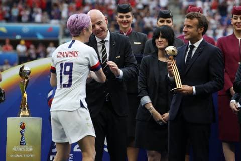 Megan Rapinoe of USA and Gianni Infantino after the final whistle of the FIFA Women s World Cup match at Stade de Lyon, Lyon. Picture date: 7th July 2019. Picture credit should read: Jonathan Moscrop Sportimage EDITORIAL USE ONLY. No use with unauthorised audio, video, data, fixture lists, club league logos or live services. Online in-match use limited to 120 images, no video emulation. No use in betting, games or single club league player publications. SPI-0113-0073