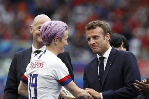 USA x Holland LYON, LY - 07.07.2019: USA X HOLLAND - Megan Rapinoe of the United States receives the gold boot of FIFA President Gianni Infantino and the President of France Emmanuel Macron after the United States wins the 2019 FIFA Women& 39;s World Cup Final 2-0 against the Netherlands at the Lyon Stadium, in Lyon, France. (Photo: Richard Callis Fotoarena) x1759460x  RichardxCallis
