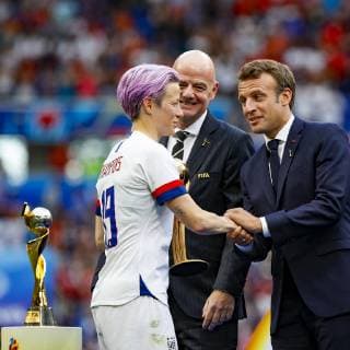 USA x Holland LYON, LY - 07.07.2019: USA X HOLLAND - Megan Rapinoe of the United States receives gold ball from FIFA President Gianni Infantino and the President of France Emmanuel Macron after the United States wins the 2019 FIFA Women& 39;s World Cup Final 2-0 against the Netherlands at the Lyon Stadium, in Lyon, France. (Photo: Richard Callis Fotoarena) x1759469x  RichardxCallis