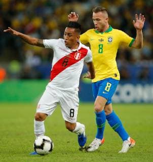 Brazil vs. Peru RIO DE JANEIRO, RJ - 07.07.2019: BRAZIL VS. PERU - Christian Cueva of Peru contests ball with Arthur of Brazil during a match between Brazil and Peru, valid for the 2019 Copa America final, held this Sunday (07) at the Maracanã Stadium in Rio de Janeiro, RJ. (Photo: Marcelo Machado de Melo Fotoarena) x1759809x  MarceloxMachadoxdexMelo