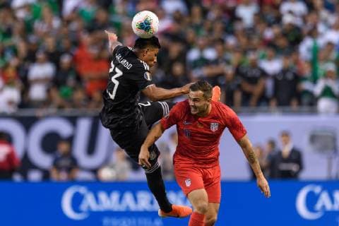 CHICAGO, IL - JULY 07: Mexico midfielder Jesus Gallardo (23) and USA forward Jordan Morris (11) play a ball in the air in the first half during the CONCACAF Gold Cup final match between the United States and Mexico on July 07, 2019, at Soldier Field in Chicago, IL. (Photo By Daniel Bartel Icon Sportswire) SOCCER: JUL 07 CONCACAF Gold Cup Finals - USA v Mexico Icon190707003
