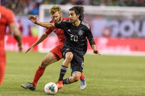 CHICAGO, IL - JULY 07: Mexico forward Rodolfo Pizarro (20) controls the ball defended by USA defender Tim Ream (13) in the second half during the CONCACAF Gold Cup final match between the United States and Mexico on July 07, 2019, at Soldier Field in Chicago, IL. (Photo By Daniel Bartel Icon Sportswire) SOCCER: JUL 07 CONCACAF Gold Cup Finals - USA v Mexico Icon190707015