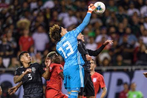 CHICAGO, IL - JULY 07: Mexico goalkeeper Guillermo Ochoa (13) jumps to punch the ball in the second half during the CONCACAF Gold Cup final match between the United States and Mexico on July 07, 2019, at Soldier Field in Chicago, IL. (Photo By Daniel Bartel Icon Sportswire) SOCCER: JUL 07 CONCACAF Gold Cup Finals - USA v Mexico Icon190707020
