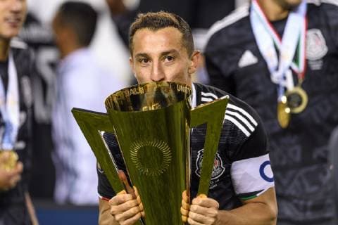 CHICAGO, IL - JULY 07: Mexico midfielder Andres Guardado (18) kisses the trophy after the CONCACAF Gold Cup final match between the United States and Mexico on July 07, 2019, at Soldier Field in Chicago, IL. (Photo By Daniel Bartel Icon Sportswire) SOCCER: JUL 07 CONCACAF Gold Cup Finals - USA v Mexico Icon190707026