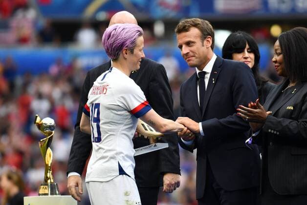 Megan Rapinoe USA 15 with the Golden Boot Award at the Handshake with Emmanuel Macron President of France congratulating her, 07 07 2019, Lyon France , Football, FIFA Womens World Cup 2019, Final , USA Netherlands, FIFA REGULATIONS PROHIBIT ANY USE OF PHOTOGRAPHS AS IMAGE SEQUENCES AND OR QUASI VIDEO xmkx