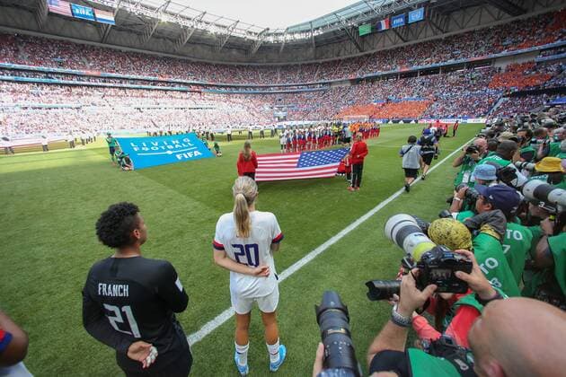 Players respect the USA National anthem before kick off of the FIFA Women s World Cup match at Stade de Lyon, Lyon. Picture date: 7th July 2019. Picture credit should read: Jonathan Moscrop Sportimage EDITORIAL USE ONLY. No use with unauthorised audio, video, data, fixture lists, club league logos or live services. Online in-match use limited to 120 images, no video emulation. No use in betting, games or single club league player publications. SPI-0113-0214