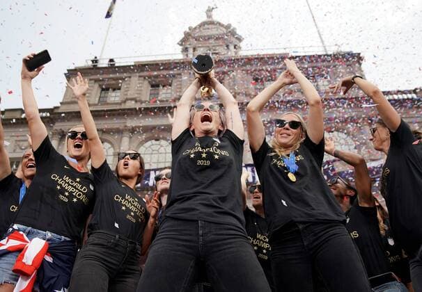 Confetti falls on Megan Rapinoe and the players of the United States Women s Soccer team celebrate at City Hall after a Ticker Tape Parade at the Canyon Of Heroes on Wednesday, July 10, 2019 in New York City. Team USA defeated the Netherlands 2-0 to capture their second straight World Cup title.  NYP20190710119 JOHNxANGELILLO