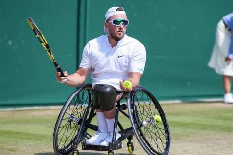 Dylan Alcott of Australia during the quad wheelchair singles semi-final match of the Wimbledon Lawn Tennis Championships against Koji Sugeno of Japan at the All England Lawn Tennis and Croquet Club in London, England on July 11, 2019.  (107759609)