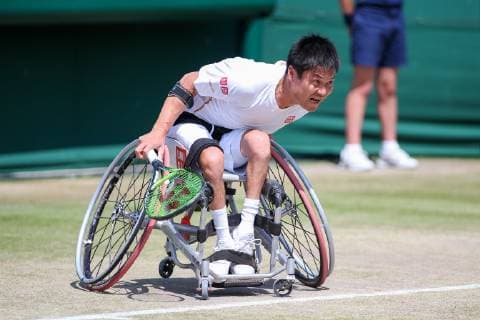 Shingo Kunieda of Japan during the men s wheelchair singles quarter-final match of the Wimbledon Lawn Tennis Championships against Gordon Reid of Great Britain at the All England Lawn Tennis and Croquet Club in London, England on July 11, 2019.  (107759800)