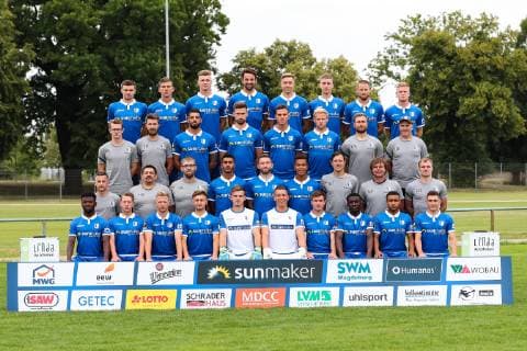 Team photo 1 FC Magdeburg 3 League 2019 2020 4 row from left Björn Rother, Brian Koglin, Philipp Harant, Christian Beck, Anthony Roczen, Pascal Schmedemann, Timo Perthel, Thore Jacobsen 3 row from left Philipp Brix physiotherapist , Tino Meyer physiotherapist , Jürgen Gjasula, Dustin Bomheuer, Tobias Müller, Sören Bertram, Kevin Waliczek Game Analyst , Dirk Keller Reha Athletics Coach 2 row from left Oliver Poranzke Team Doctor , Heiko Horner Team Manager Zeugwart , Dr Stefan Wiegand Team Doctor , Tarek Chahed, Rico Preißinger, Marcel Costly, Matthias Tischer Goalkeeper Coach, Stefan Krämer Head Coach, Silvio Bankert Co Trainer 1 row from left Manfred Osei Kwadwo, Marvin Temp, Dominik Ernst, Anton Kanther, Morten Behrens, Alexander Brunst, Charles Elie Laprevotte, Sirlord Conteh, Leon Bell Bell, Mario Kvesic Missing Dr Jan Philipp Schüttrumpf Team doctor 3 League PortraÌˆttermin 2019 2020 Official photo opportunity 1 FC Magdeburg on the training ground at the MDCC Arena in Magdeburg Germany, football, man, men,GER,11 07 2019