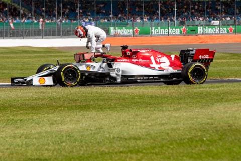 12th June 2019, Silverstone, Northampton, England; F1 Grand Prix of Great Britain, Practice sessions; Alfa Romeo Racing driver Kimi Raikkonen jumps out of his broken down car  ActionPlus12153058 TimxWilliams