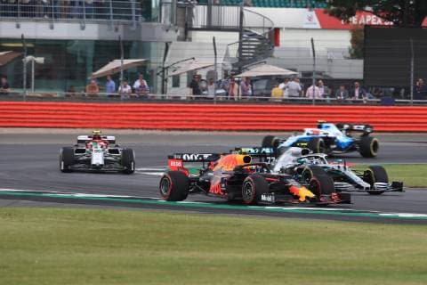 12th June 2019, Silverstone, Northampton, England; F1 Grand Prix of Great Britain, Practice sessions; Mercedes AMG Petronas Motorsport, Valtteri Bottas and Aston Martin Red Bull Racing, Pierre Gasly  ActionPlus12153109 Octane