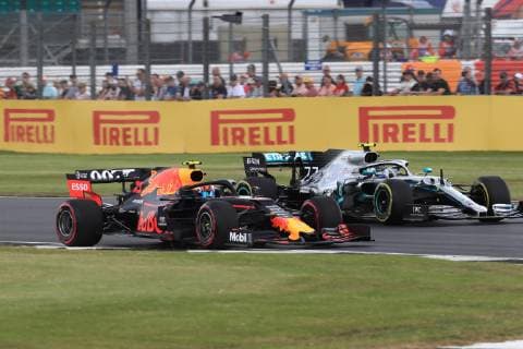 12th June 2019, Silverstone, Northampton, England; F1 Grand Prix of Great Britain, Practice sessions; Mercedes AMG Petronas Motorsport, Valtteri Bottas and Aston Martin Red Bull Racing, Pierre Gasly  ActionPlus12153110 Octane
